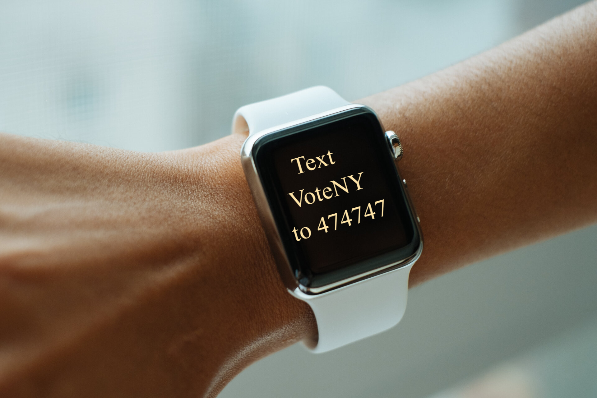 Smart watch with the words Text VoteNY to 474747