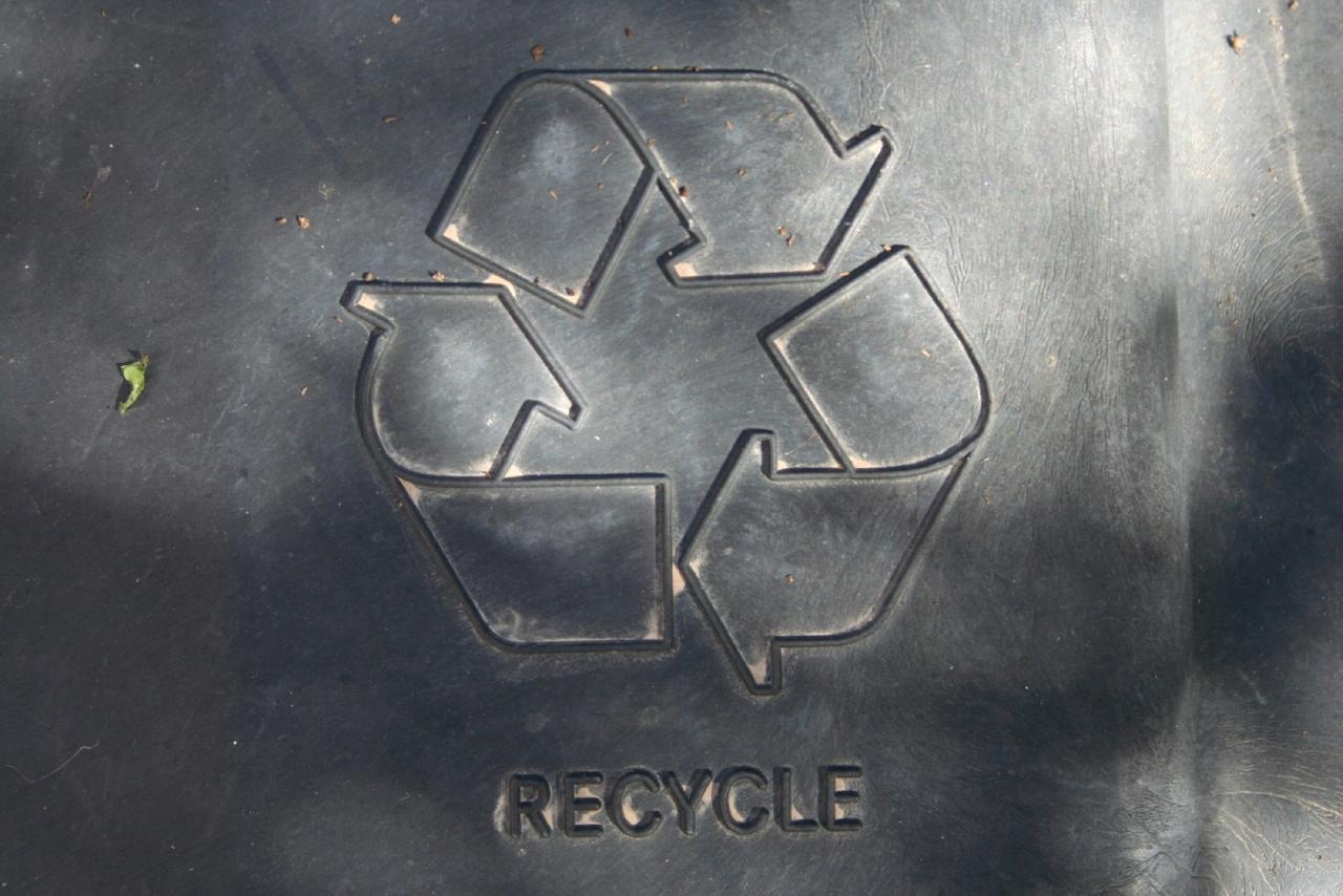 recycled symbol on metal can